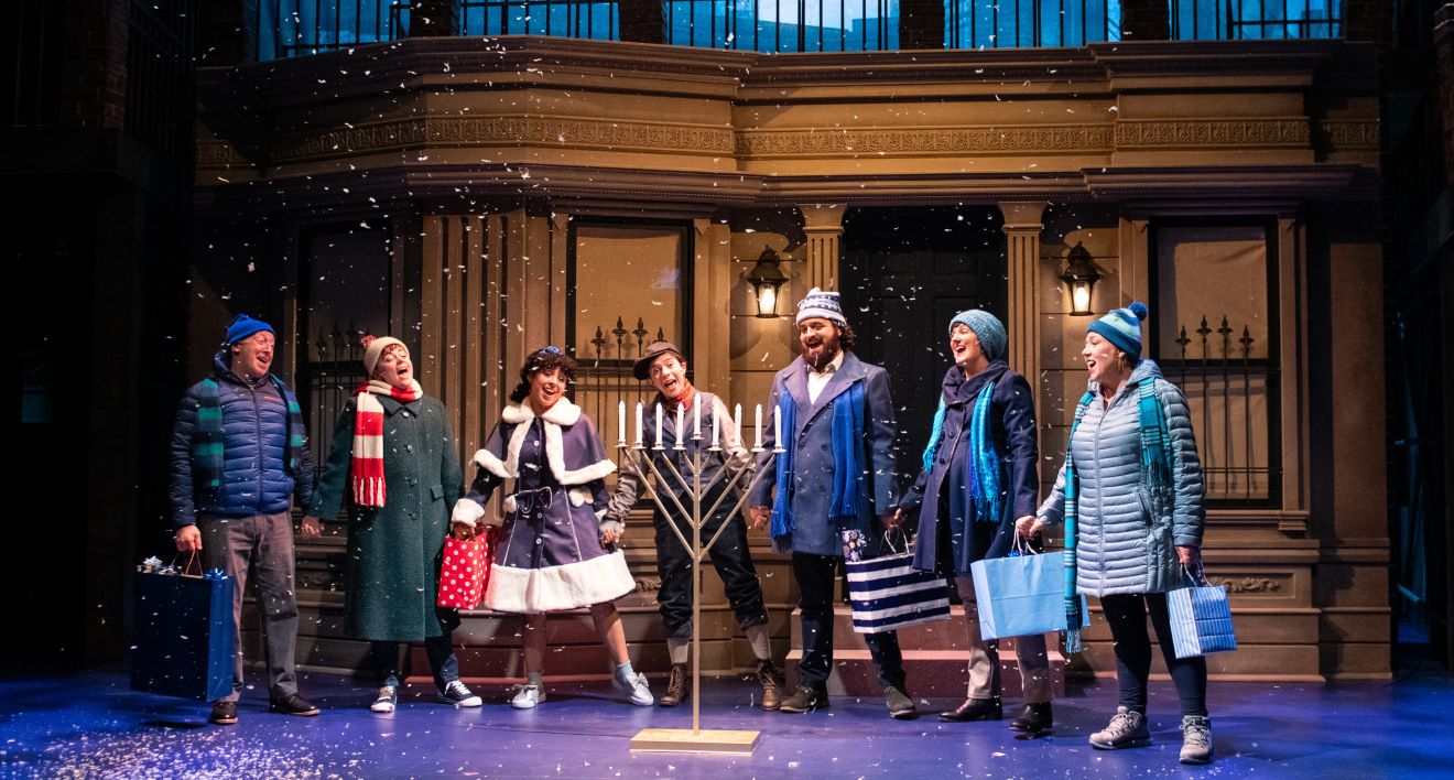 <p>Cast of <em>A Hanukkah Carol, or GELT TRIP! The Musical</em>. Photo by Margot Schulman.</p>