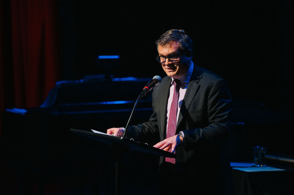 <p>Artistic Director Ryan Rilette speaking at the <em>Broadway in Bethesda </em>Gala. Photo by Cameron Whitman Photography.  </p>