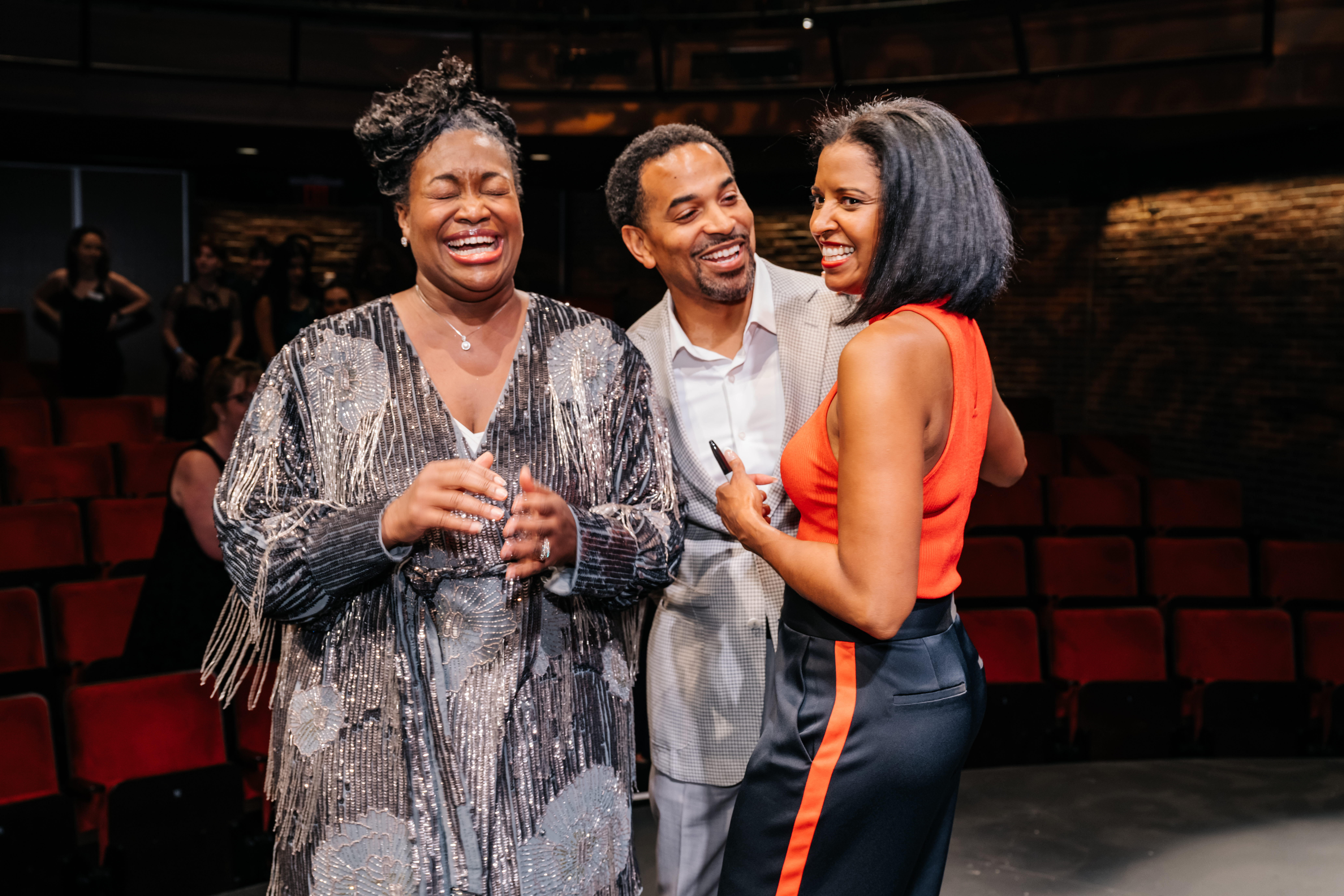 <p>Michele Jawando, Councilmember Will Jawando, and Renée Elise Goldsberry. Photo by Cameron Whitman Photography.</p>